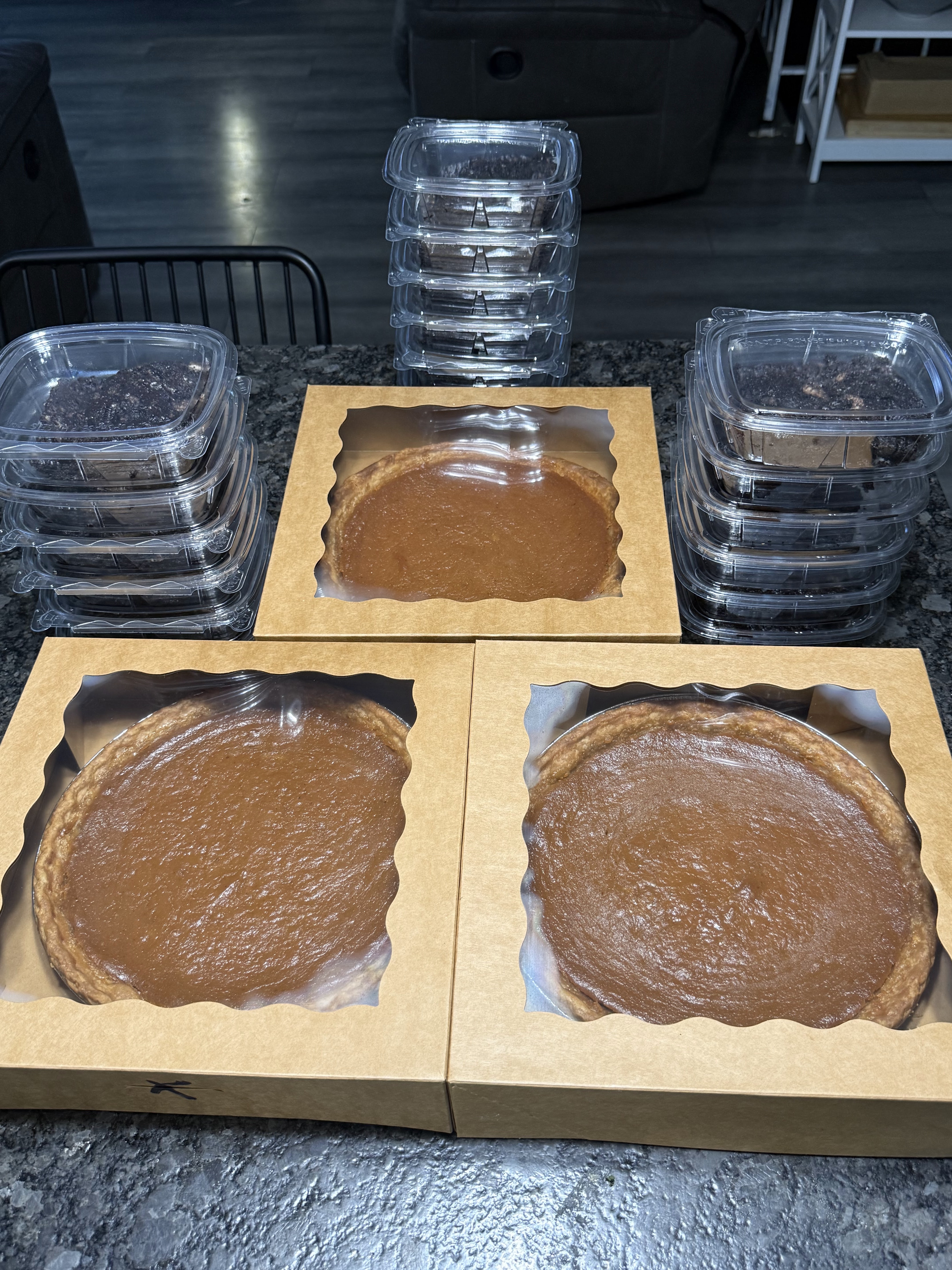 Boxed pies and packaged desserts prepared for a Clean Vibez order